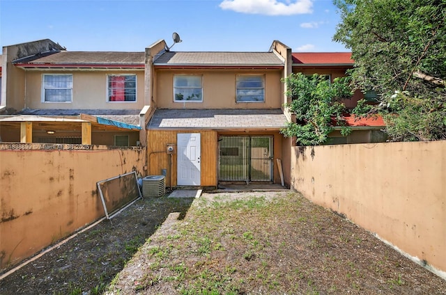 2767 NW 197th Ter, Miami Gardens, FL 33056 - back of house with stucco siding and a shingled roof