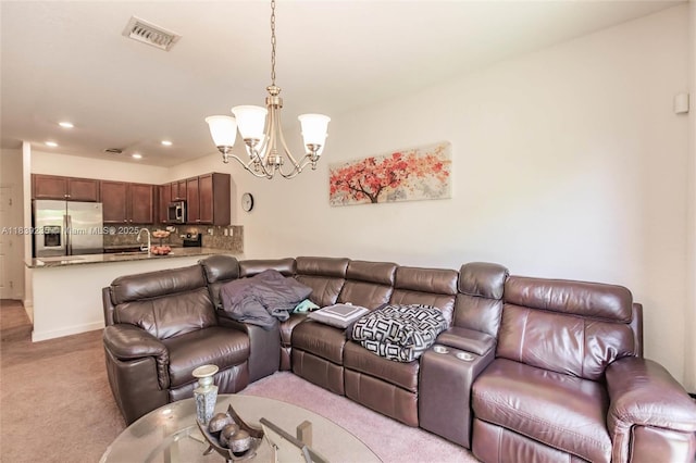 6586 S Anise Ct, Davie, FL 33314 - living area featuring a chandelier, light colored carpet, and recessed lighting