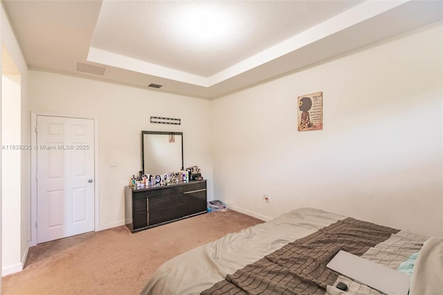 6586 S Anise Ct, Davie, FL 33314 - carpeted bedroom with baseboards and a tray ceiling