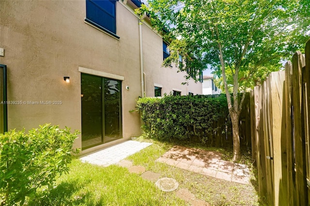6586 S Anise Ct, Davie, FL 33314 - view of yard featuring a patio area