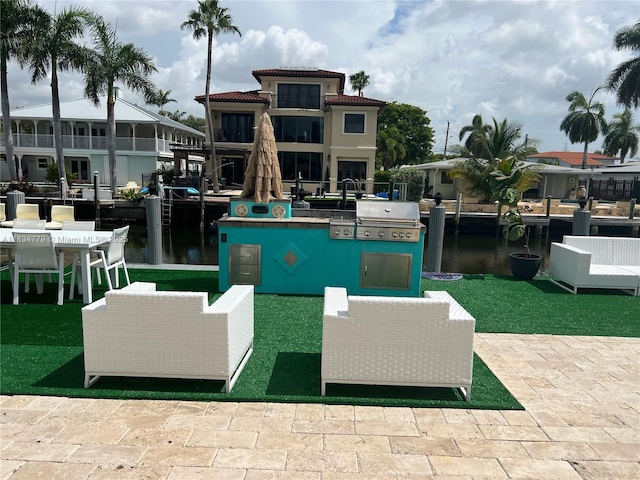 2321 SE 15th St, Pompano Beach, FL 33062 - view of patio featuring a water view and area for grilling