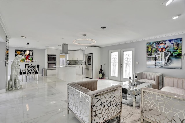 2321 SE 15th St, Pompano Beach, FL 33062 - living area with light marble finish flooring, recessed lighting, french doors, and ornamental molding