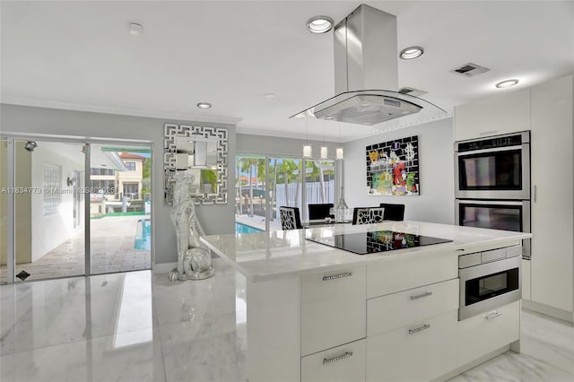 2321 SE 15th St, Pompano Beach, FL 33062 - kitchen with stainless steel appliances, modern cabinets, white cabinets, recessed lighting, and island range hood