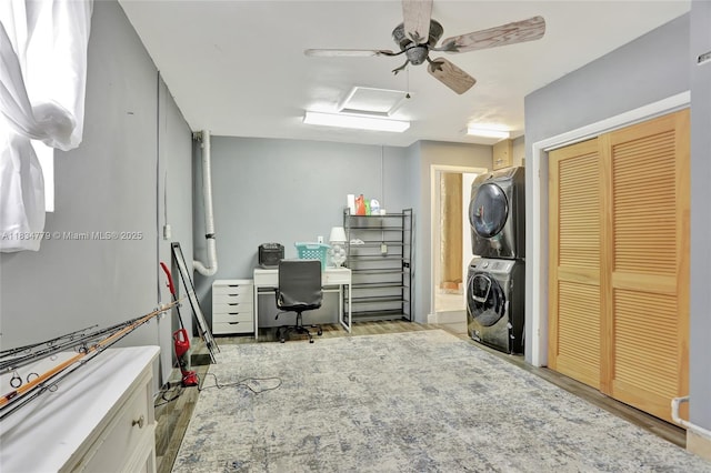 2321 SE 15th St, Pompano Beach, FL 33062 - home office featuring stacked washer / drying machine, wood finished floors, and ceiling fan