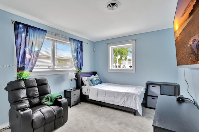 2321 SE 15th St, Pompano Beach, FL 33062 - bedroom featuring light carpet