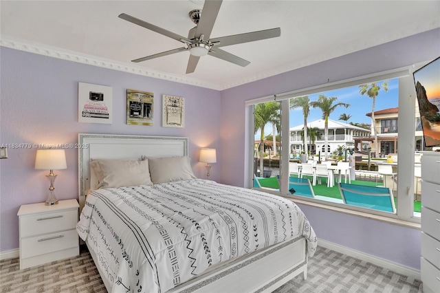 2321 SE 15th St, Pompano Beach, FL 33062 - bedroom with ceiling fan and carpet flooring