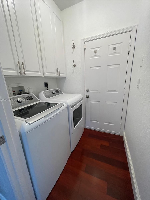 2817 SW 187th Ave, Miramar, FL 33029 - laundry area featuring washer and clothes dryer, dark wood-type flooring, and cabinet space