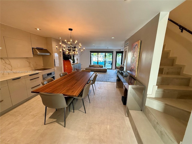 1945 NE 123rd St, North Miami, FL 33181 - dining room with a chandelier, stairway, and recessed lighting