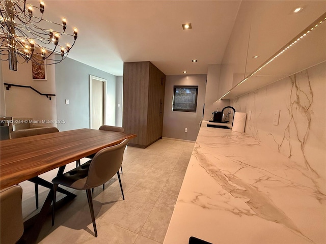 1945 NE 123rd St, North Miami, FL 33181 - kitchen featuring range and a chandelier