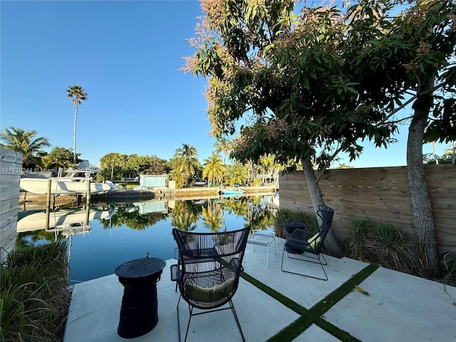 1945 NE 123rd St, North Miami, FL 33181 - view of patio with a water view