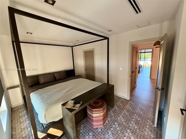 1945 NE 123rd St, North Miami, FL 33181 - bedroom with tile patterned flooring and baseboards
