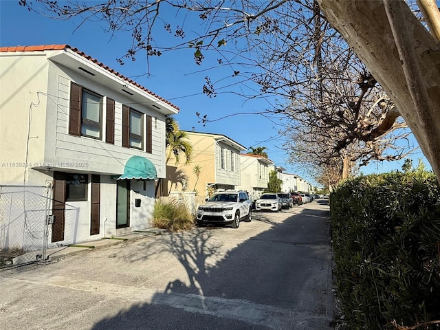1945 NE 123rd St, North Miami, FL 33181 - view of asphalt road featuring a residential view