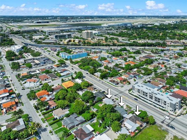 871 SE 8th Ave, Hialeah, FL 33010 - aerial view of property and surrounding area featuring nearby urban area