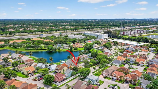 10871 SW 11th Mnr, Davie, FL 33324 - aerial view of property's location with a nearby body of water and nearby suburban area
