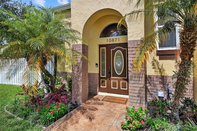 10871 SW 11th Mnr, Davie, FL 33324 - doorway to property featuring stucco siding