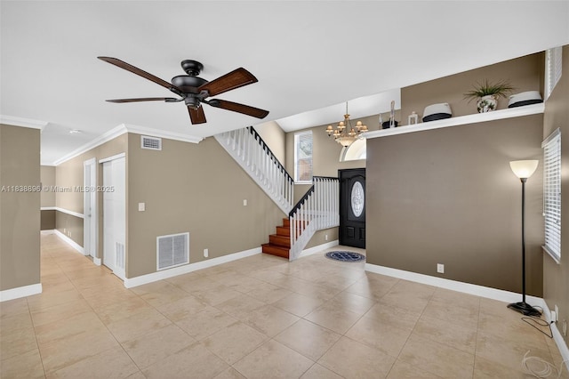 10871 SW 11th Mnr, Davie, FL 33324 - foyer featuring light tile patterned floors, ceiling fan, ornamental molding, stairs, and a chandelier