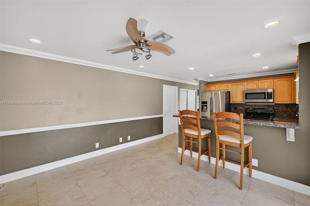 10871 SW 11th Mnr, Davie, FL 33324 - kitchen featuring appliances with stainless steel finishes, ornamental molding, recessed lighting, tasteful backsplash, and a peninsula