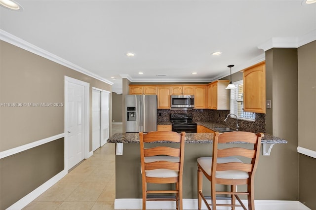 10871 SW 11th Mnr, Davie, FL 33324 - kitchen with appliances with stainless steel finishes, decorative backsplash, dark stone countertops, crown molding, and a peninsula