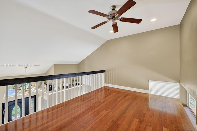 10871 SW 11th Mnr, Davie, FL 33324 - unfurnished room with ceiling fan, wood finished floors, vaulted ceiling, and recessed lighting