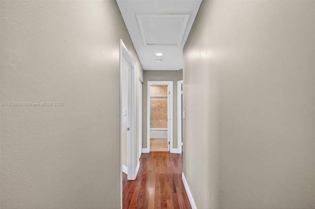10871 SW 11th Mnr, Davie, FL 33324 - corridor featuring attic access and dark wood-style flooring