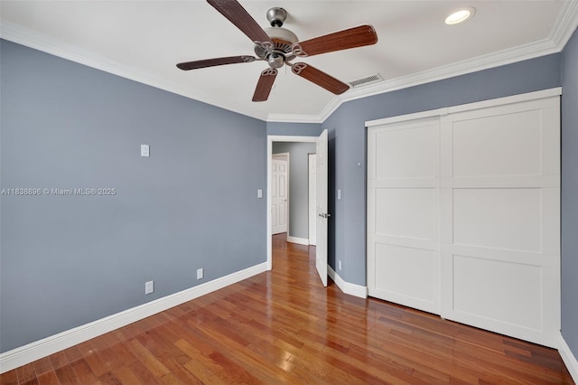 10871 SW 11th Mnr, Davie, FL 33324 - unfurnished bedroom with ornamental molding, wood finished floors, a closet, a ceiling fan, and recessed lighting