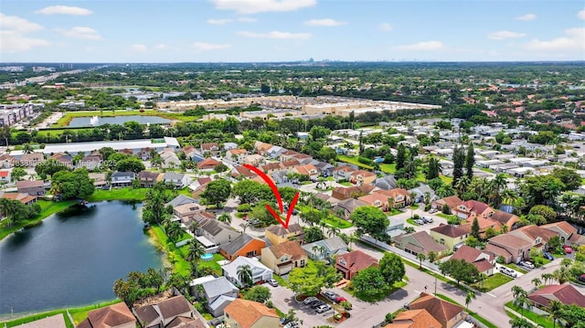 10871 SW 11th Mnr, Davie, FL 33324 - aerial perspective of suburban area with a nearby body of water