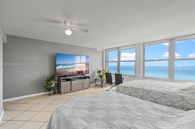2899 Collins Ave Unit 931, Miami Beach, FL 33140 - bedroom with light tile patterned flooring and ceiling fan