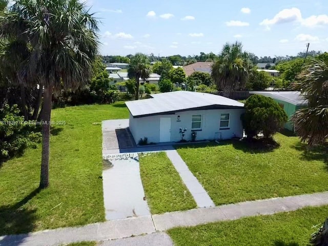 3460 Normandy Dr, Port Charlotte, FL 33952 - view of front of home featuring a front lawn and stucco siding