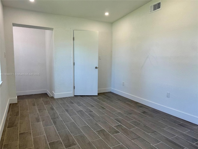 3460 Normandy Dr, Port Charlotte, FL 33952 - unfurnished room featuring dark wood-style floors and recessed lighting
