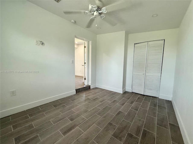 3460 Normandy Dr, Port Charlotte, FL 33952 - unfurnished bedroom with dark wood-style floors, a closet, and a ceiling fan