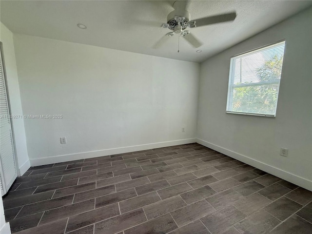 3460 Normandy Dr, Port Charlotte, FL 33952 - empty room with a ceiling fan and baseboards