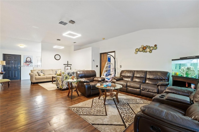 5506 Redhawk Dr, New Port Richey, FL 34655 - living area with hardwood / wood-style flooring and lofted ceiling