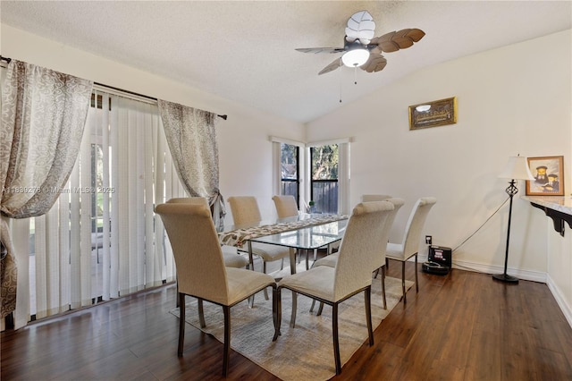5506 Redhawk Dr, New Port Richey, FL 34655 - dining room featuring vaulted ceiling, wood finished floors, and ceiling fan