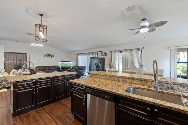 5506 Redhawk Dr, New Port Richey, FL 34655 - kitchen featuring stainless steel dishwasher, open floor plan, lofted ceiling, a ceiling fan, and dark wood finished floors