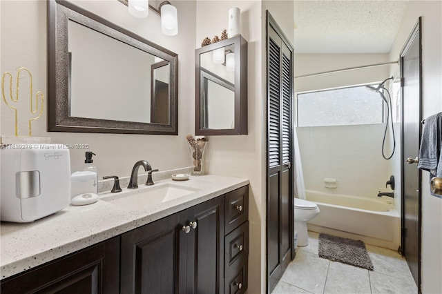 5506 Redhawk Dr, New Port Richey, FL 34655 - bathroom with vanity,  shower combination, a textured ceiling, tile patterned flooring, and a closet