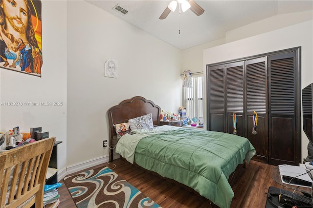 5506 Redhawk Dr, New Port Richey, FL 34655 - bedroom with wood finished floors, a closet, ceiling fan, and vaulted ceiling