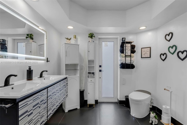 2239 NW 65th Ave, Margate, FL 33063 - bathroom with a raised ceiling, double vanity, and recessed lighting