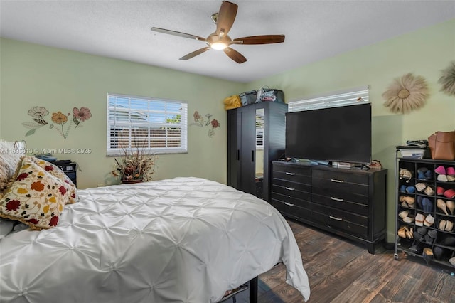 2239 NW 65th Ave, Margate, FL 33063 - bedroom with dark wood-style flooring and a ceiling fan