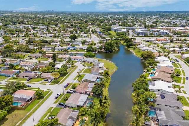2239 NW 65th Ave, Margate, FL 33063 - aerial view of property and surrounding area with a nearby body of water and nearby suburban area