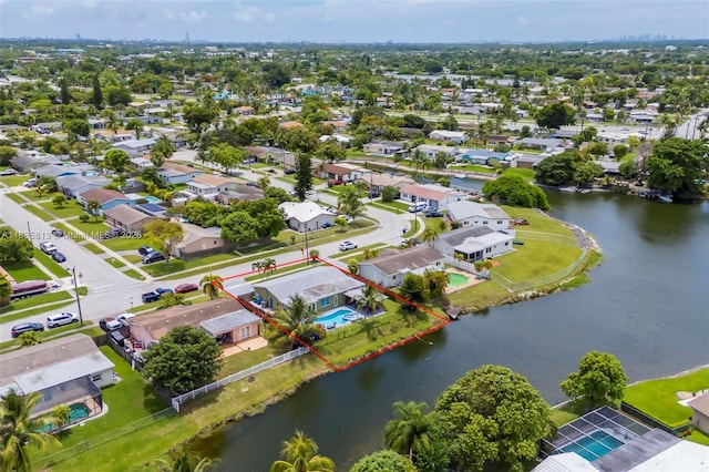 2239 NW 65th Ave, Margate, FL 33063 - aerial view of residential area featuring a nearby body of water and property parcel outlined