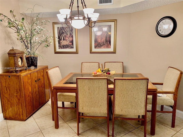 7751 Southampton Ter Unit 310, Tamarac, FL 33321 - dining room featuring a chandelier and light tile patterned floors