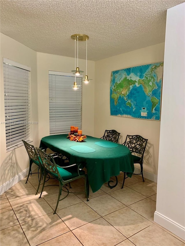 7751 Southampton Ter Unit 310, Tamarac, FL 33321 - dining space featuring a textured ceiling and tile patterned floors