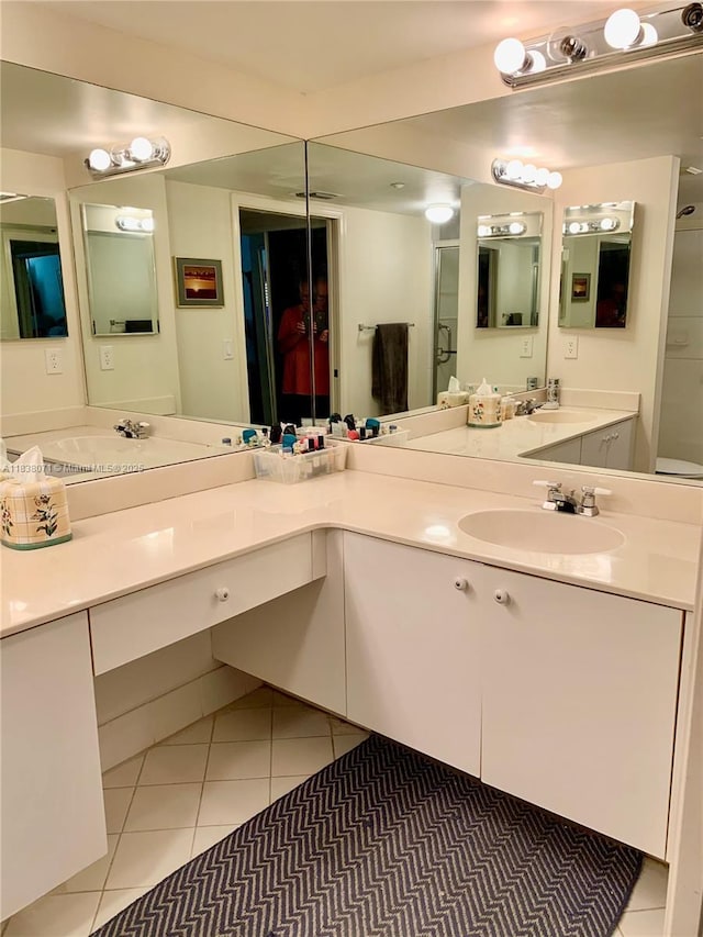 7751 Southampton Ter Unit 310, Tamarac, FL 33321 - bathroom featuring tile patterned floors and double vanity