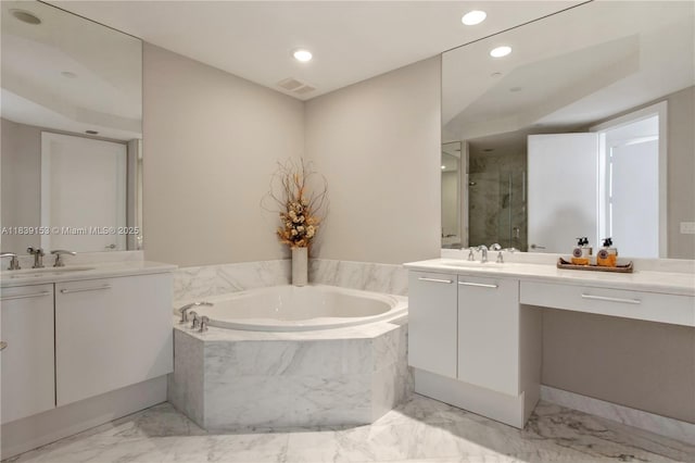 4100 Island Blvd Unit 2303, Aventura, FL 33160 - full bath featuring two vanities, a garden tub, marble finish flooring, and recessed lighting