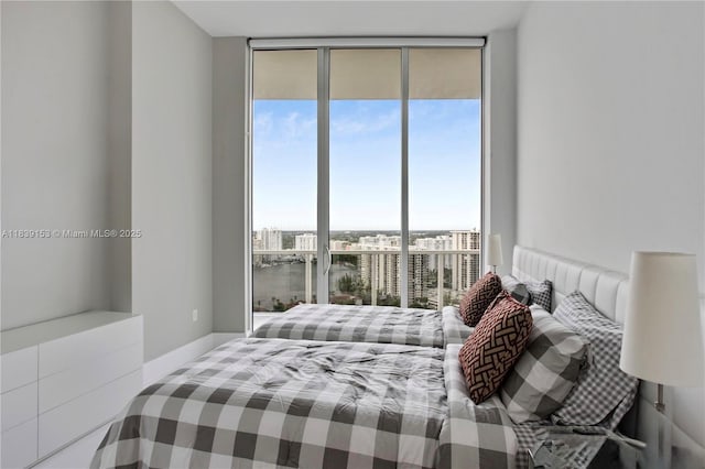 4100 Island Blvd Unit 2303, Aventura, FL 33160 - bedroom with expansive windows and multiple windows