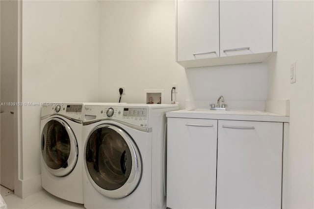 4100 Island Blvd Unit 2303, Aventura, FL 33160 - washroom with cabinet space and separate washer and dryer