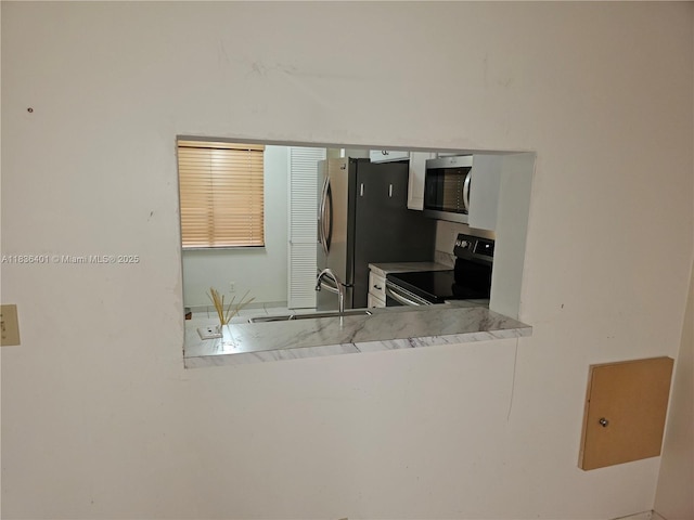 7270 Ashford Pl Unit 308, Delray Beach, FL 33446 - kitchen featuring stainless steel appliances and a sink