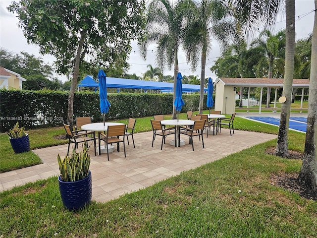 7270 Ashford Pl Unit 308, Delray Beach, FL 33446 - view of patio / terrace featuring outdoor dining space