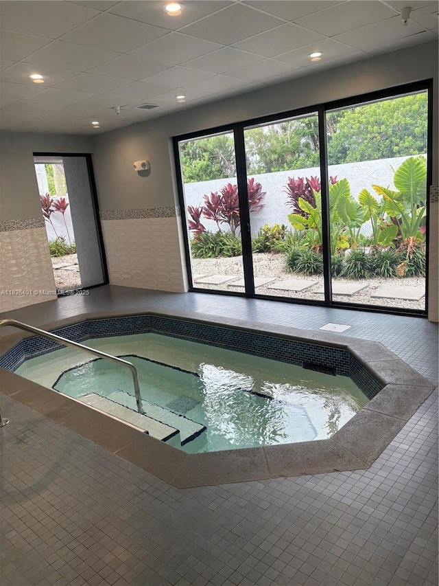 7270 Ashford Pl Unit 308, Delray Beach, FL 33446 - view of pool featuring an in-ground hot tub