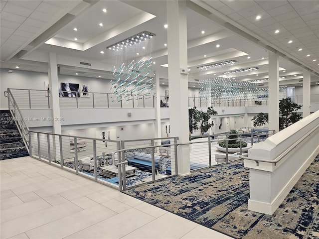 7270 Ashford Pl Unit 308, Delray Beach, FL 33446 - lobby with recessed lighting and a towering ceiling